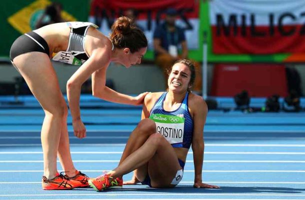 Olympic spirit: New Zealand and American runners help each other after collision