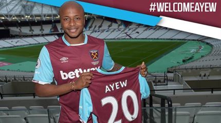Andre Ayew poses with his West Ham jersey