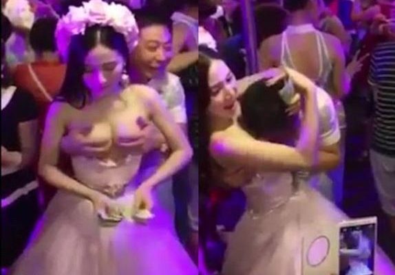 Newlywed allows guests to molest her in order to raise money for honeymoon (photos)