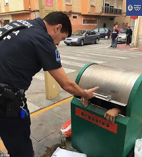 Man gets rescued after climbing inside a waste bin and getting stuck (Photos)