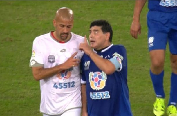 Video: Maradona and Veron scuffle during charity match as Pope watches on