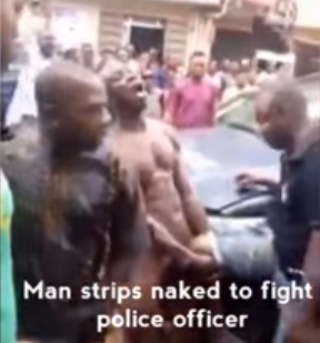 Video: Man strips naked to fight a police officer