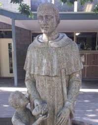 Catholic school forced to cover up new statue of a saint giving out bread due to an unintentional provocative design