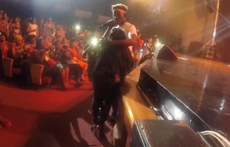 Shocking Video: Lady goes crazy after touching Mr. Eazi at Concert