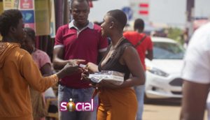 Ahuofe Patri hits the street to teach people how to use a condom |Photos