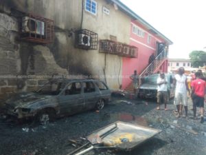 PHOTOS: Rubbish fire guts storey building in Accra, destroys cars