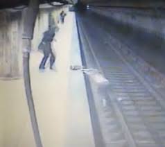 Woman caught on camera pushing her husband's pregnant girlfriend on railway track that crushed her to death |graphic video