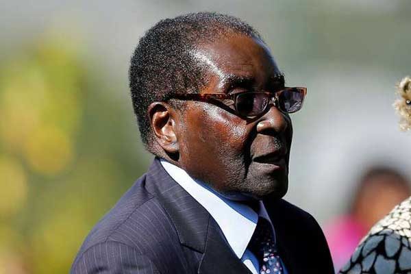 Robert Mugabe leaves Zimbabwe for the first time after power loss