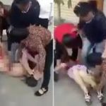 SHOCKING VIDEO: Angry wife strips her husband's pregnant mistress in public, stamps her stomach