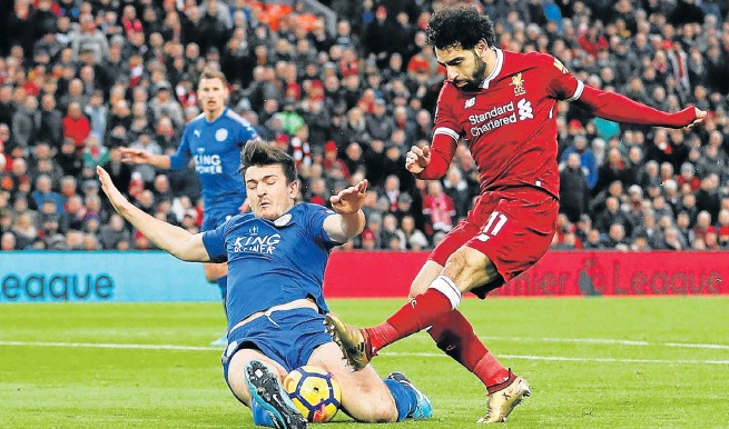Liverpool’s Mohamed Salah, right, of Egypt, in action with Leicester City’s Harry Maguire