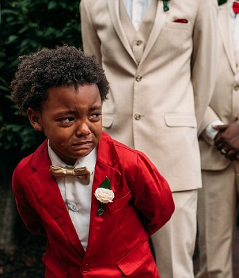 Boy, 6, cries uncontrollably as his mother walks down the aisle on her wedding day