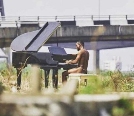 PHOTOS: Nigerian singer, Brymo shocks Africa as he appears in only 'G-String' for video shoot