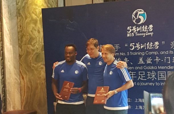 PHOTOS: Essien on tour with Spain legend in China