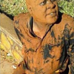 VIDEO: Journalist caught in bed with married woman forced to roll in mud