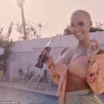 PHOTOS: Amber Rose flaunts her cleavage as she launches her own cannabis pen