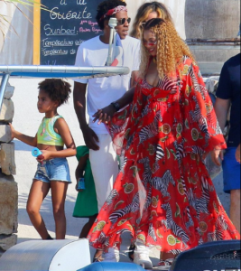 PHOTOS: Beyonce hides her stomach as she steps out with Jay Z and Blue Ivy amid pregnancy rumors