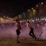Two France fans die as violence erupts across the country after World Cup win over Croatia