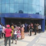 Angry Midland customers besiege Shiashe branch to withdraw their monies