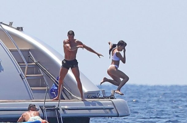 PHOTOS: Cristiano Ronaldo throws bikini-clad girlfriend into the sea as they enjoy yacht trip in Ibiza