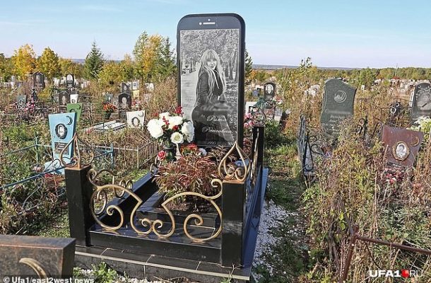 PHOTOS: 25 yr old lady gets 'dream' burial of 5-foot high tombstone in the shape of her favourite iPhone