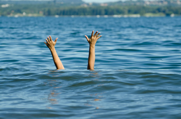 E/R: Mate drowns at mass baptism