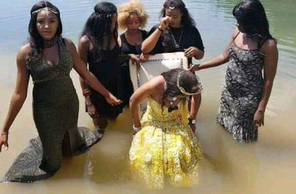 SHOCKING PHOTOS: Bride-to-be and friends hold bizarre bridal shower inside a stream