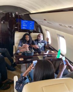 PHOTOS: Davido shows off diamond encrusted wristwatch as he flies on a private jet with girlfriend Chioma