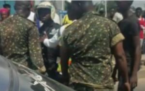 VIDEO: Armed cops, Immigration officers trade blows over 4 Nigerian suspects