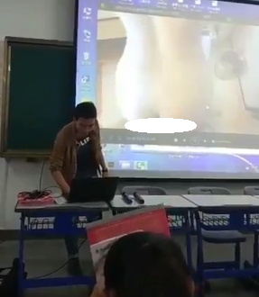 VIDEO: Teacher accidentally plays his sex tape for students while trying do a slide presentation