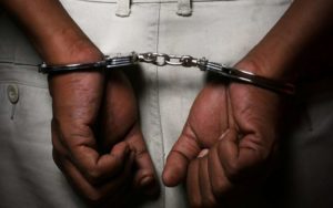 Policeman allegedly handcuffs man over GH¢2 debt (Video)