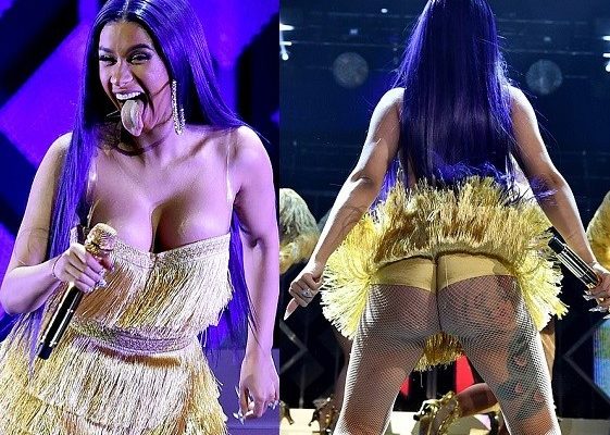 PHOTOS: Cardi B puts on a very busty display as she flaunts her backside on stage