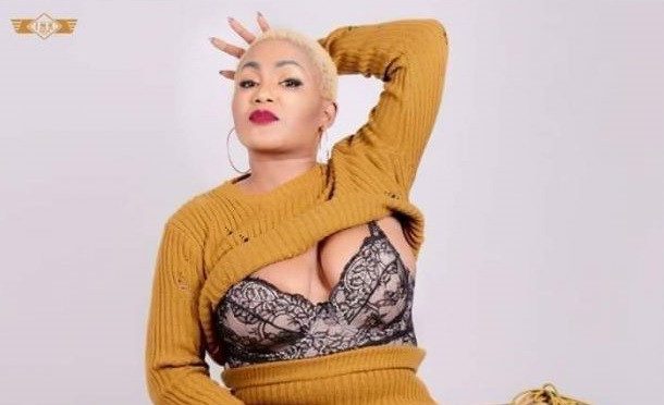 Zambian female singer summoned by Police for going pantless in this semi-nude photo