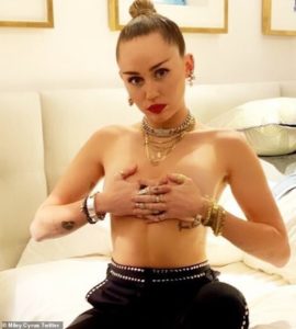 PHOTOS: Miley Cyrus goes topless on Instagram to promote her new song 'Nothing Breaks Like A Heart'