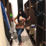 Nicki Minaj takes down her jeans to reveal her skimpy underwear in new photo