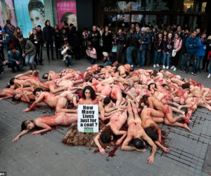 PHOTOS: Animal rights activists go naked; smear blood on themselves to protest animal cruelty