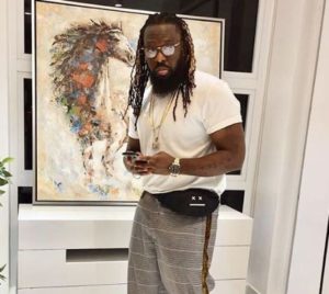 Photos: Timaya spoils himself with a G-Wagon and a Maybach for Christmas