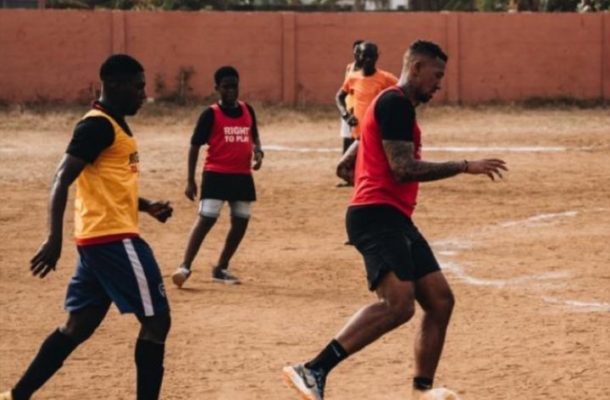 VIDEO| Jerome Boateng plays football with kids on bare pitch in Accra