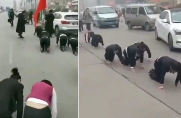 SHOCKER: Company makes employees crawl through the streets for not meeting sales targets