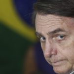 Brazil's Bolsonaro targets minority groups on first day in office