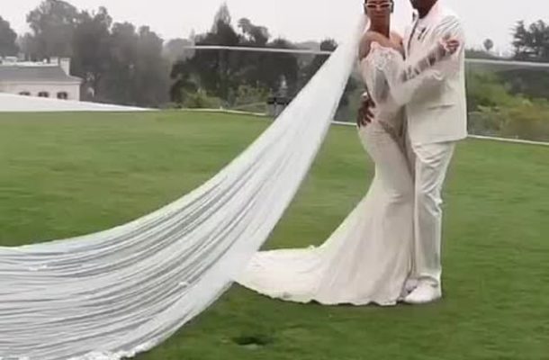 PHOTOS/VIDEO: Beyonce reveals the dress she wore to renew her vows to Jay-Z and it's stunning