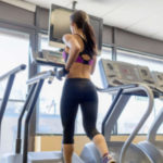 Should you hold on to the treadmill handrails while running?