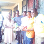 Ghanaian youngster Tijani Mohammed presents sports kits to former school