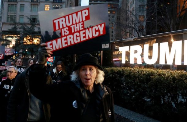 'Fake': Thousands rally in US against Trump's national emergency