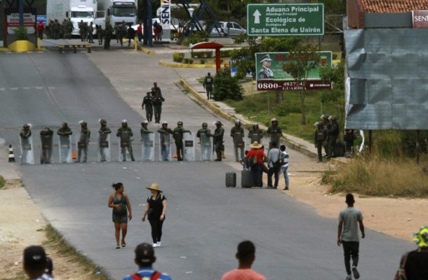 Venezuela closes Colombia border as aid dispute turns deadly