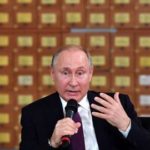 Putin signs laws against 'disrespecting' authorities, fake news
