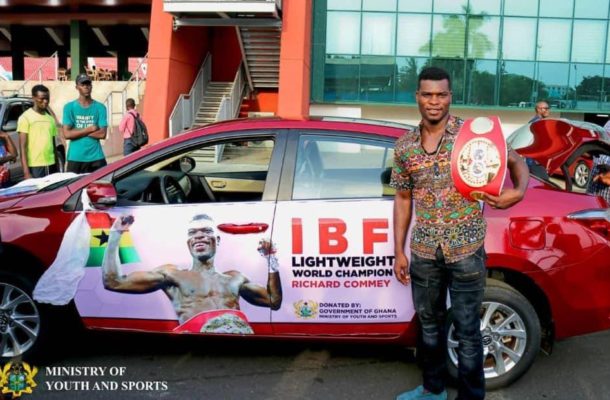 Richard Commey receives promised car from the Presidency