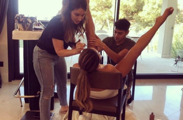 PHOTO: Chrissy Teigen widely opens legs for makeup session