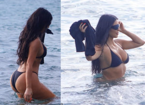 PHOTOS: Kim Kardashian showcases her killer curves in tiny bikini