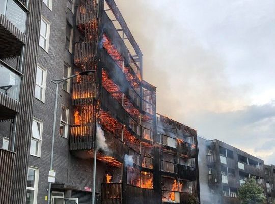 Fire rips through newly built block of flats in east London