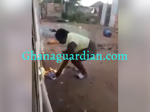 VIDEO: Ghanaian lady sets Bible aflame; says there’s no power therein as claim